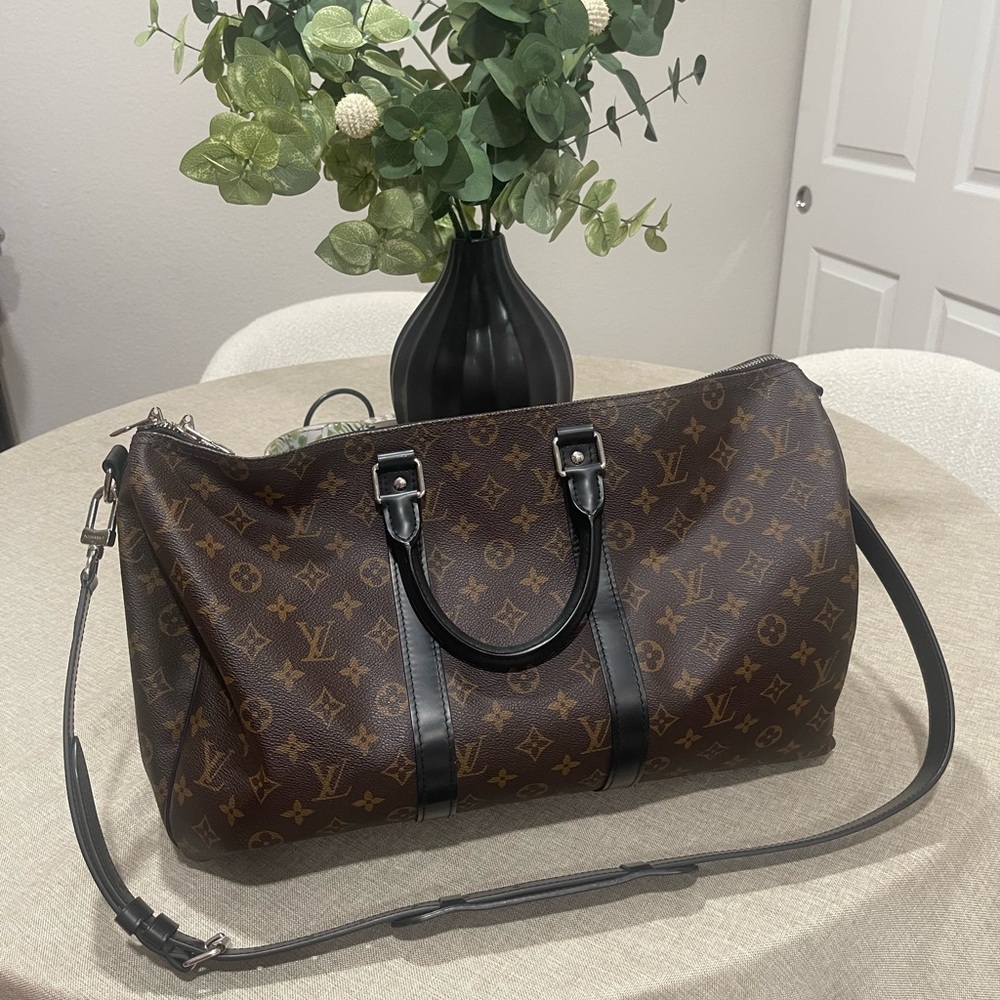 Brand New Louis Vuitton Duffel Bag! Never used! 
Keep .45 BA M. MAC